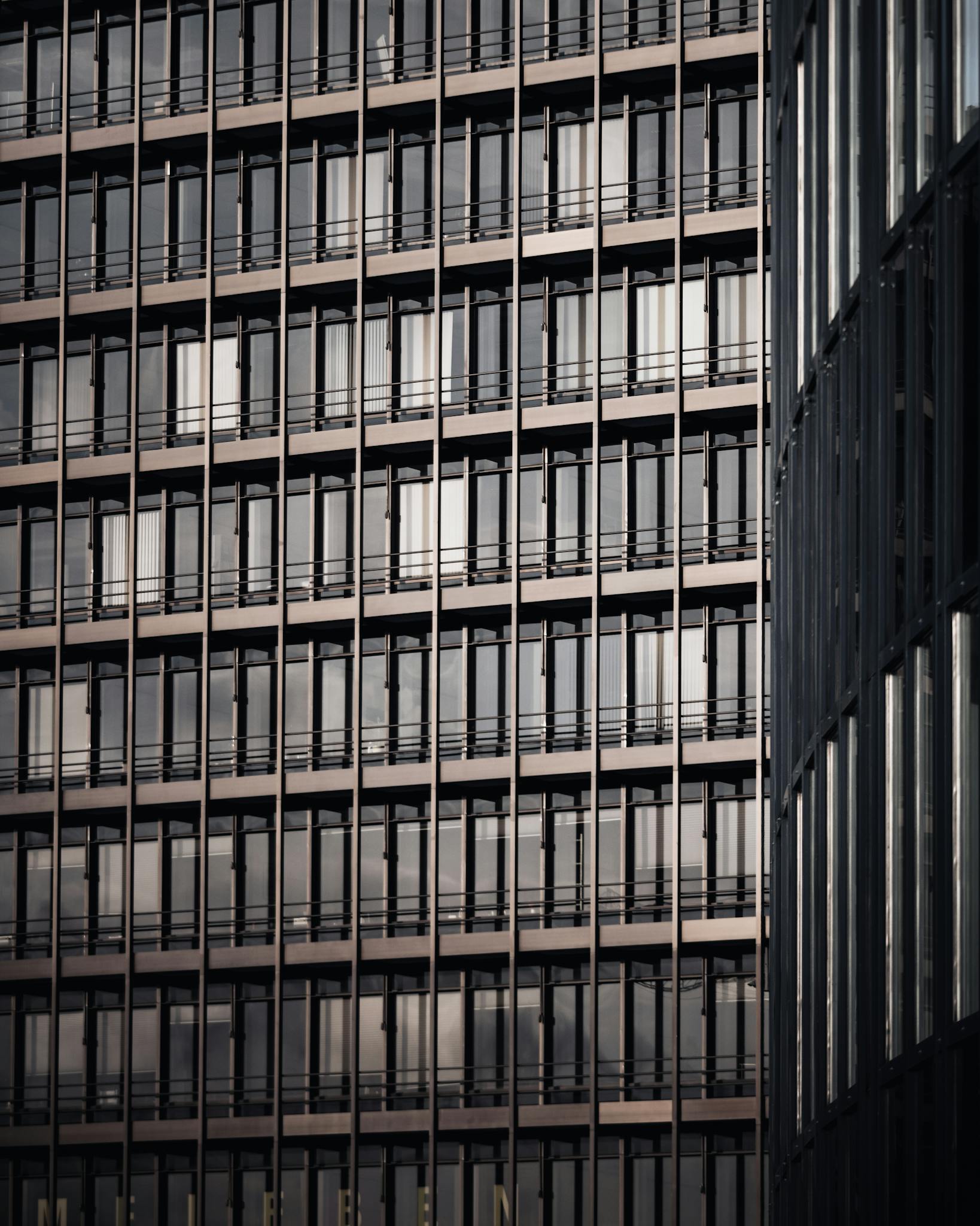 Geometric facade of a modern highrise building in Hamburg, Germany.